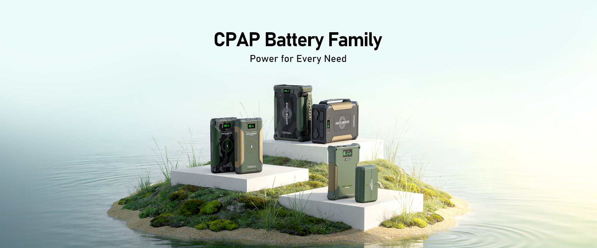 CPAP battery family displayed on a platform with water and grass in the background
