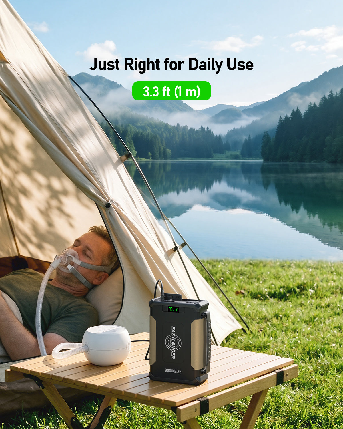 A man lies inside a tent by a lake, using an oxygen concentrator. The EASYLONGER ESMC DC Power Cord for Somnetics Transcend Micro Travel CPAP (19V, 3.2ft) sits on a table outside. Text reads: Just Right for Daily Use—3.2 ft (1 m).