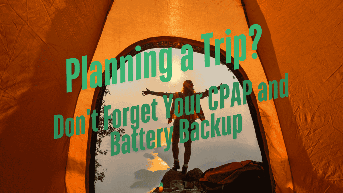 person standing outside orange tent at sunrise, planning a trip, CPAP and battery backup reminder