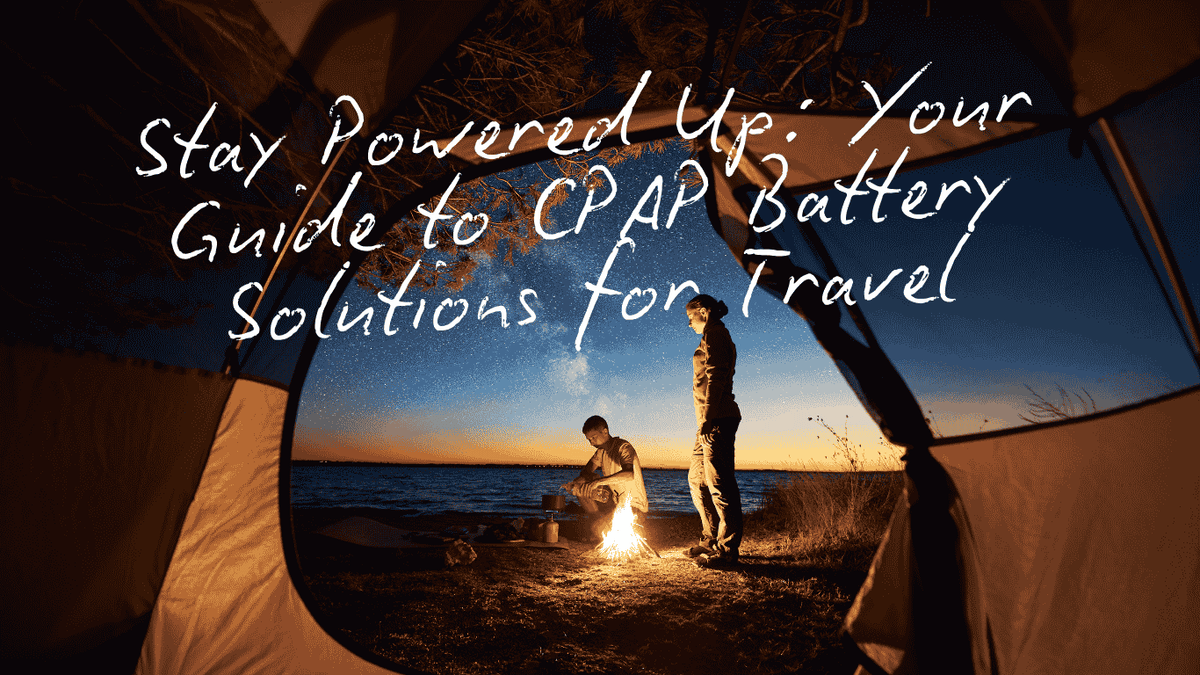 Two people by campfire at dusk seen from inside tent, CPAP battery travel guide text over image
