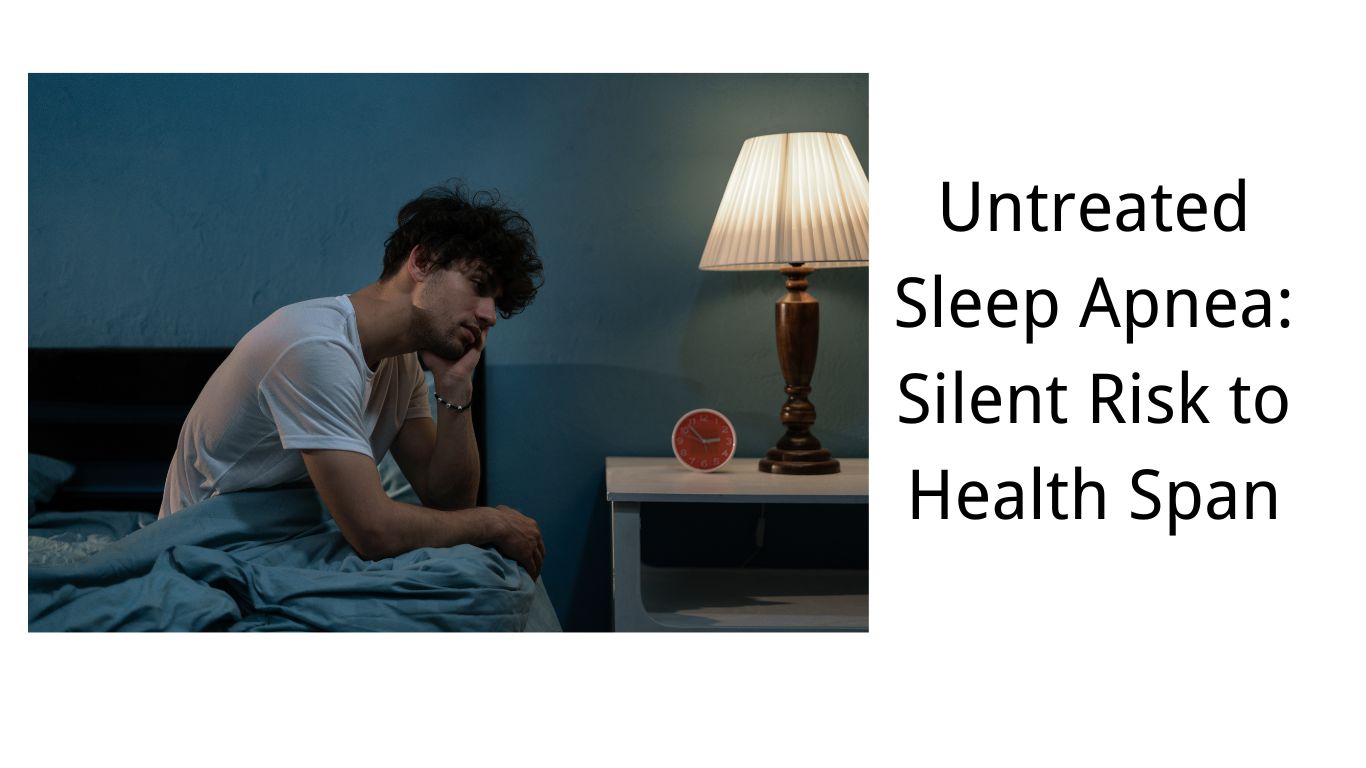 man sitting awake in bed at night looking tired, bedside table with lamp and clock, sleep apnea concept