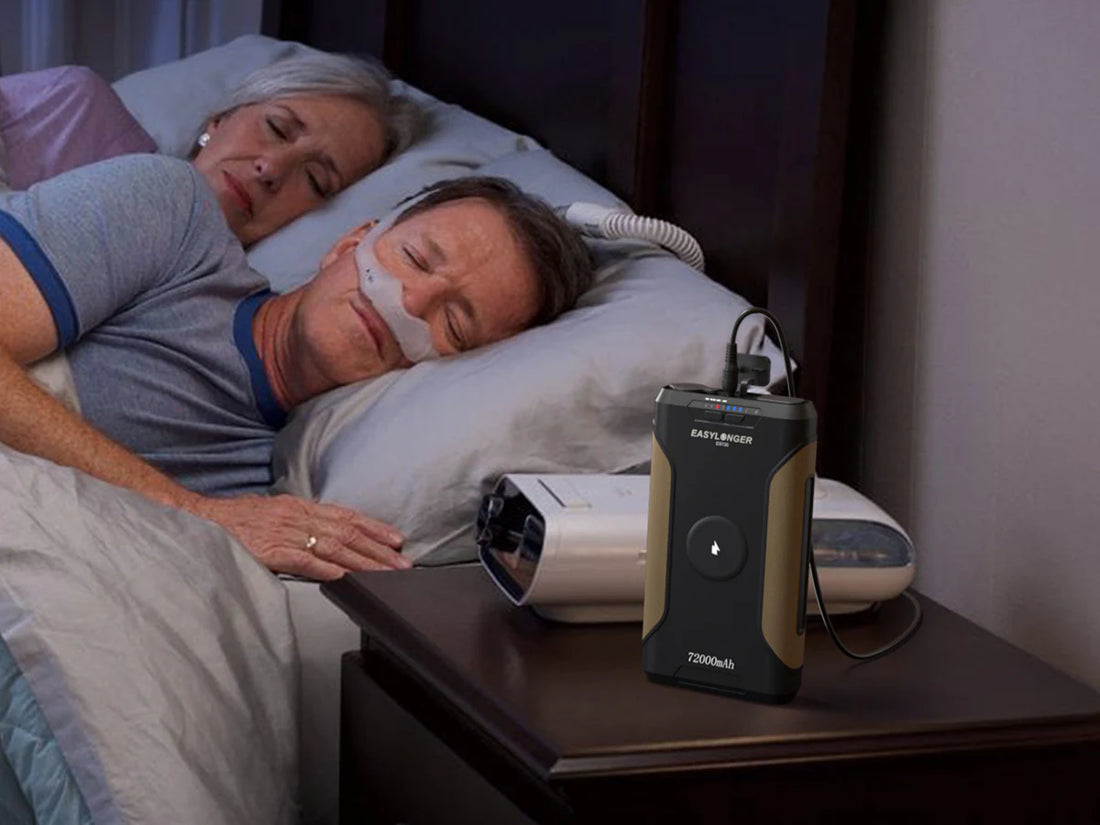 A CPAP user sleeping with backup power ready