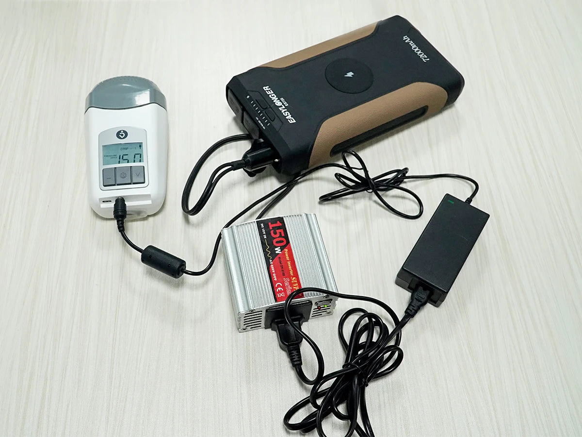 A CPAP machine, EASYLONGER battery and documented connection cables shown together